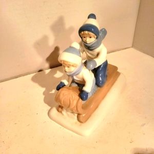Children Sleddding Porcelain Figerine By Paul Sebastián